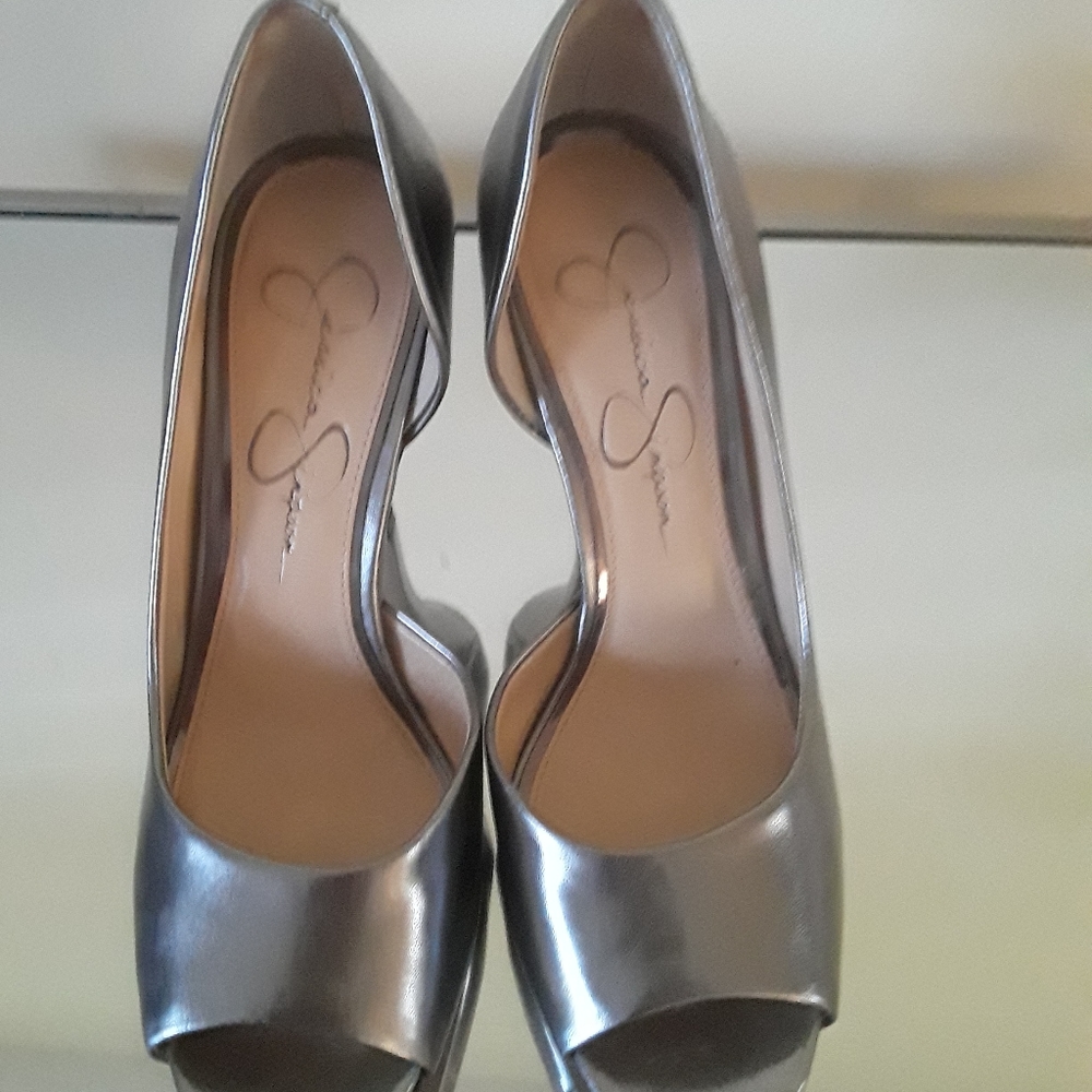 Jessica Simpson silver open toe pumps.